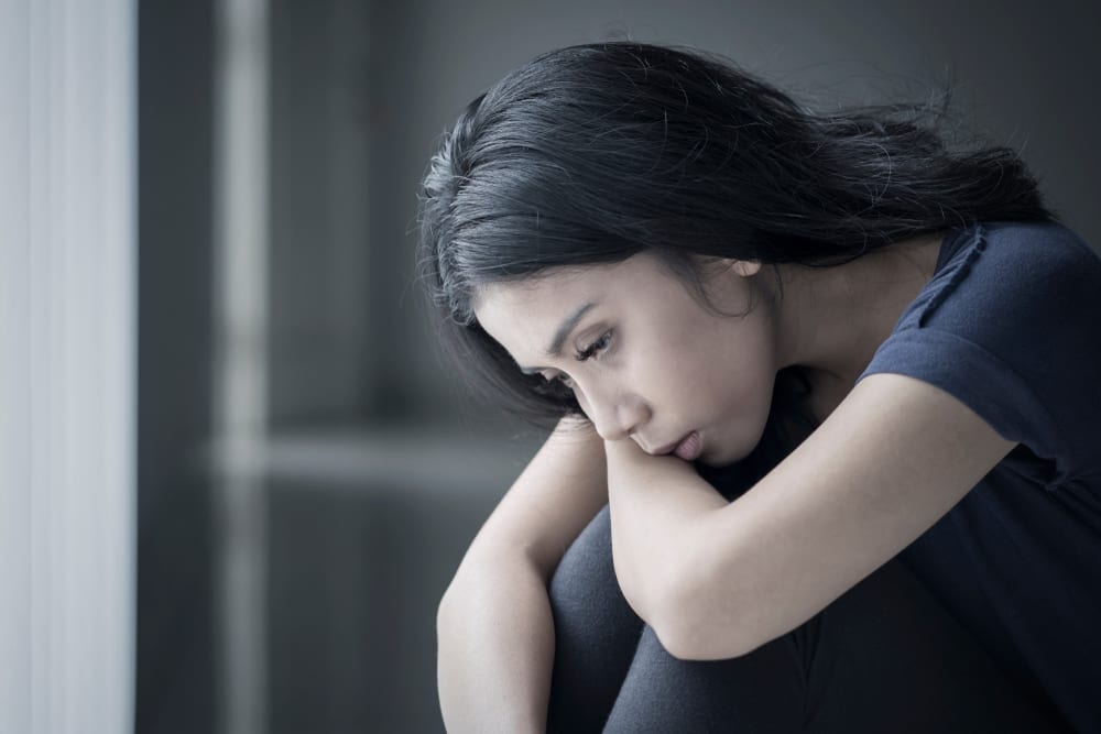 Sad woman suffering from anorexia and needs some mental health support