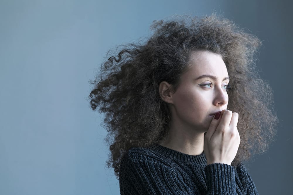 Teenager suffering from bulimia is secretive and sad and needs eating disorder support for recovery.